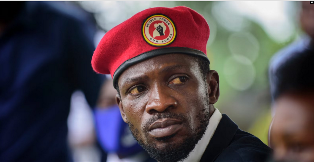 FILE - Opposition presidential challenger Bobi Wine, speaks to the media outside his home, in Magere, near Kampala, in Uganda, Jan. 26, 2021.